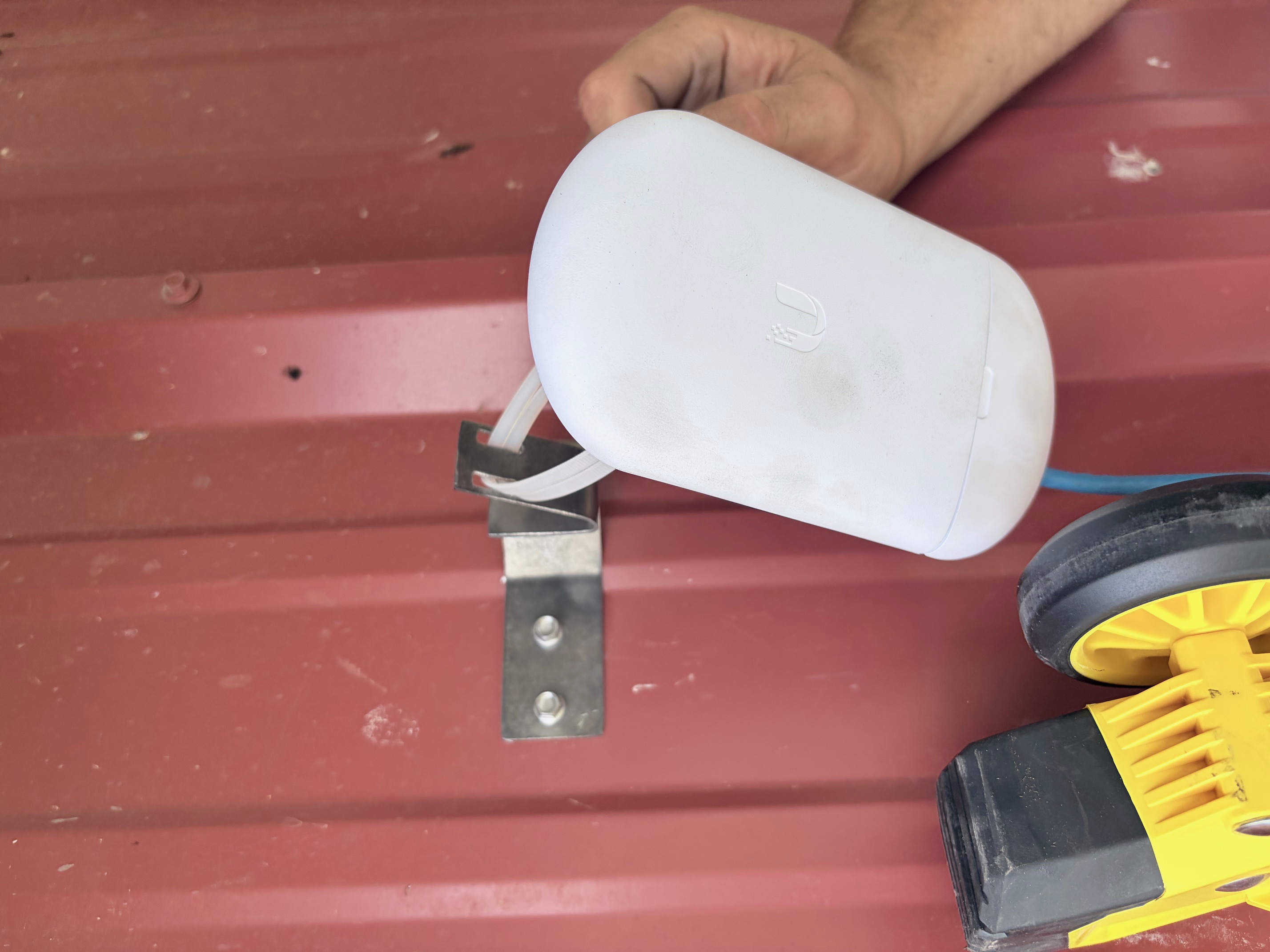 Custom multi-directional steel bracket for networking equipment fabricated from a CAD layout.